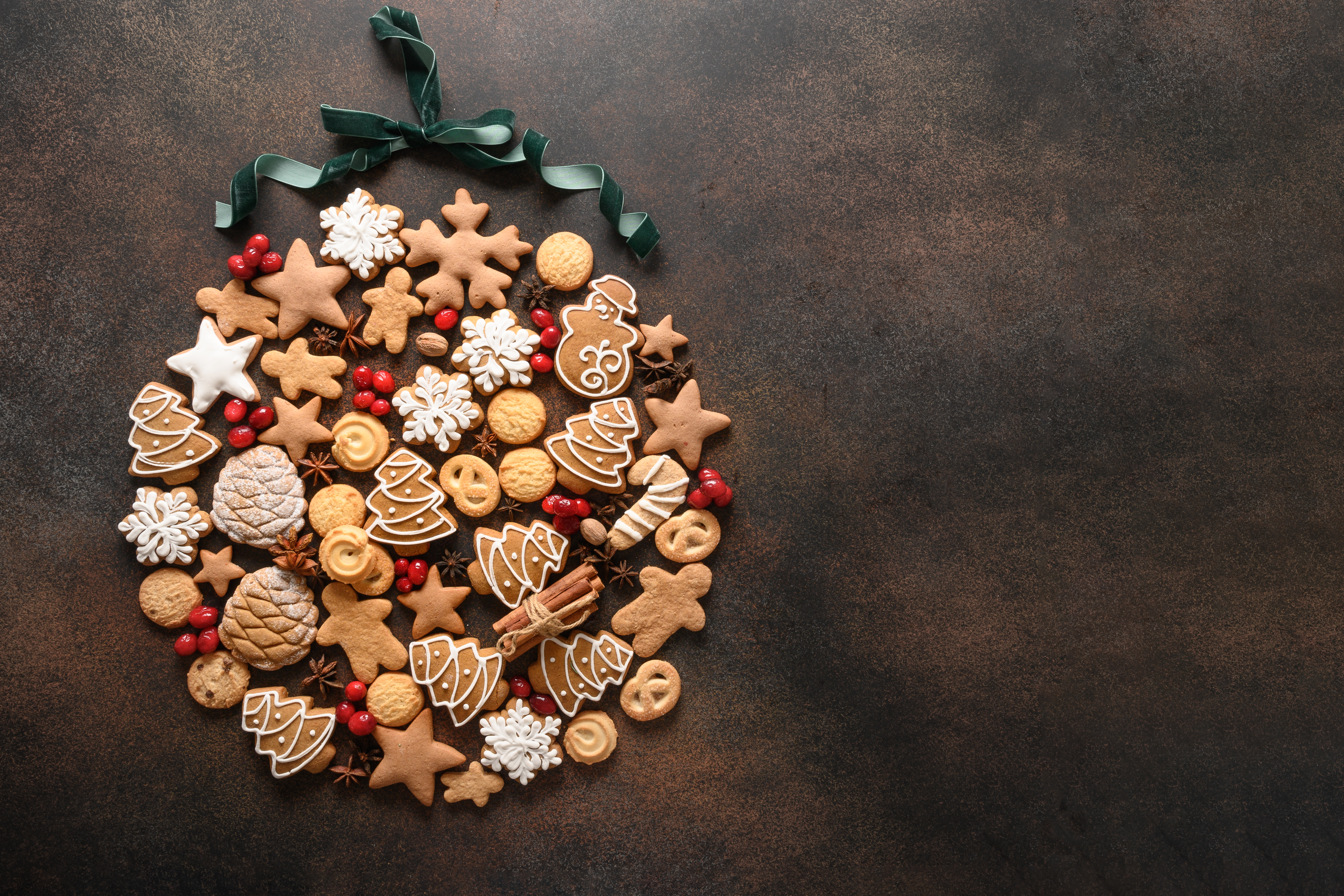 festive-cookie-ornament-on-dark-brown-surface-2026-03-20-04-54-36-utc