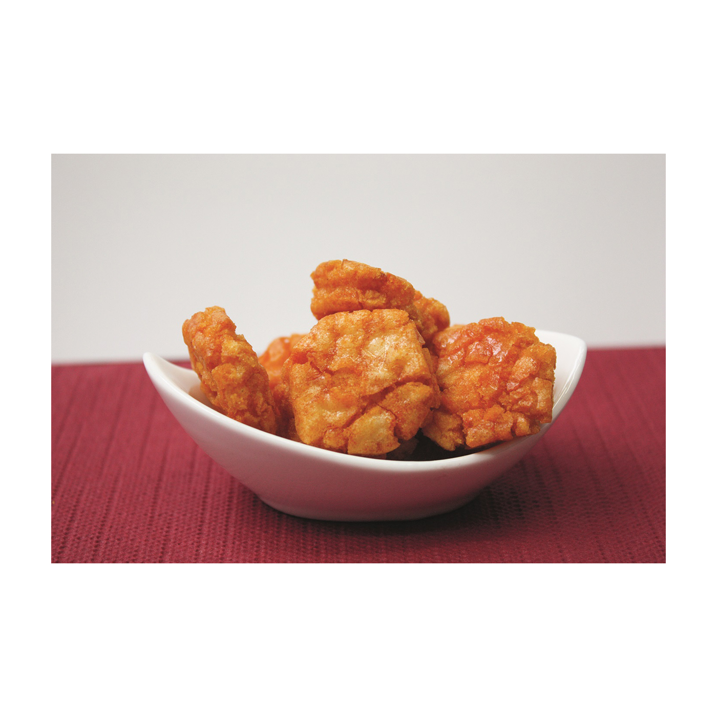 Hot Fried Chili Reiscracker 
2,5 kg pro Beutel