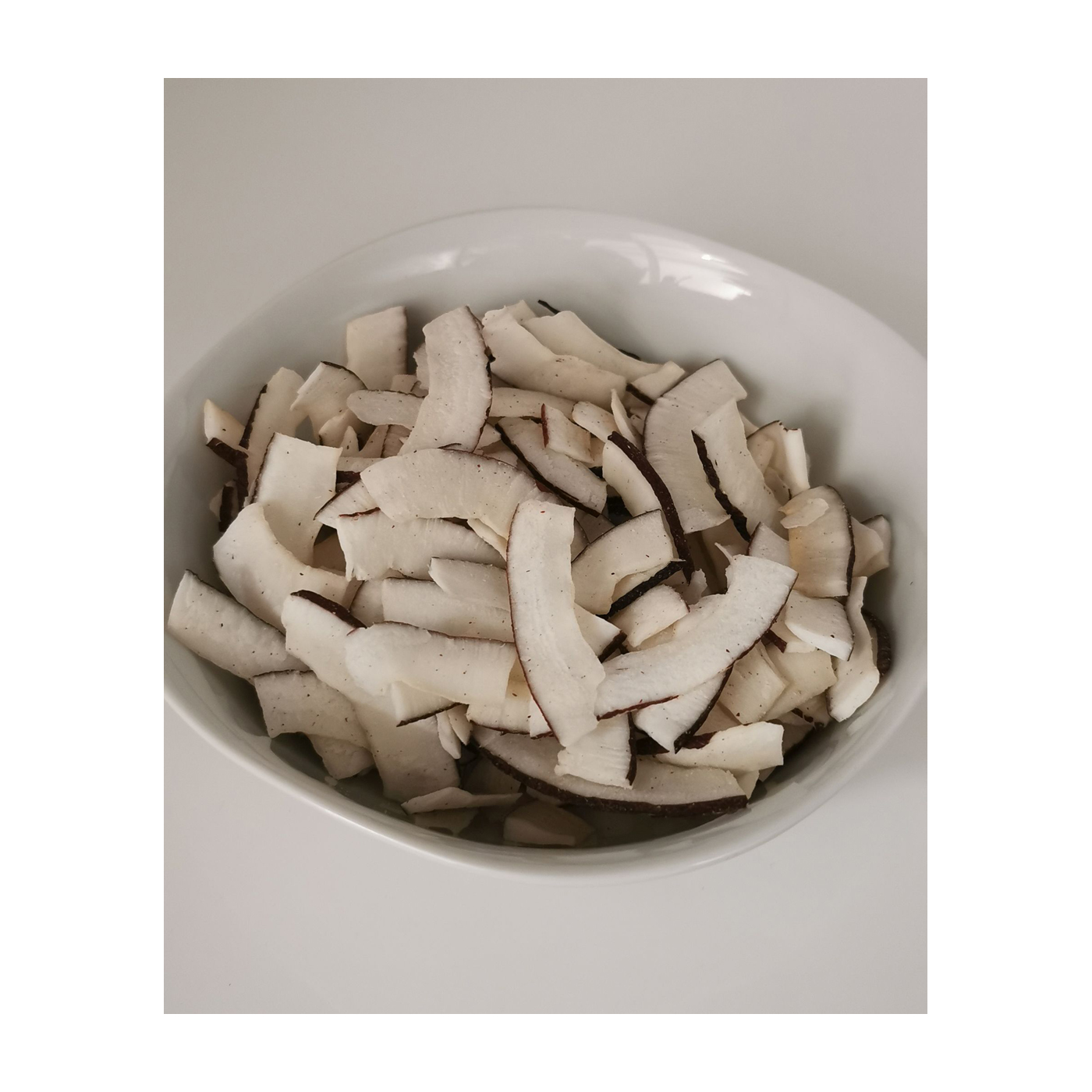 Kokosnuss Scheiben 1,0 kg in der Papiertüte