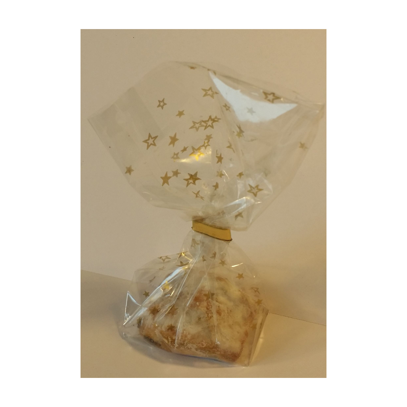 Stollenkonfekt mit 20% Marzipankern
1 Stück ~27 g im Sternen-Beutel mit Goldclip 25 Beutel pro Karton
