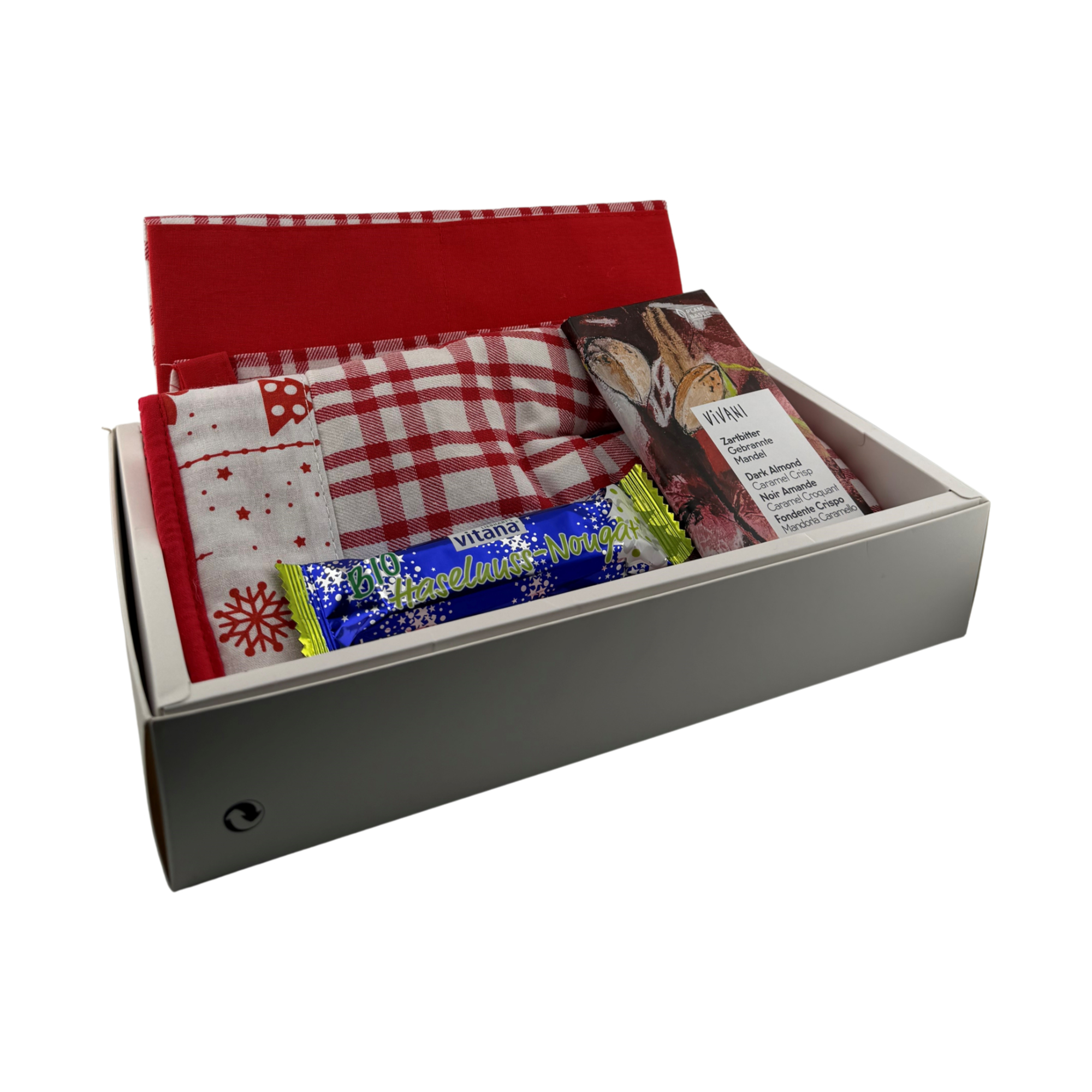 Weihnachten zum heiß anfassen Box BIO - Set aus Küchenschürze und Ofenhandschuh mit weihnachtlichem Muster. 200 g/m² Baumwolle, Liebharts BIO Haselnuss-Riegel in Nougat Schokolade 40g & Vivani BIO Zartbitter Gebrannte Mandel Schokoladentafel 80g